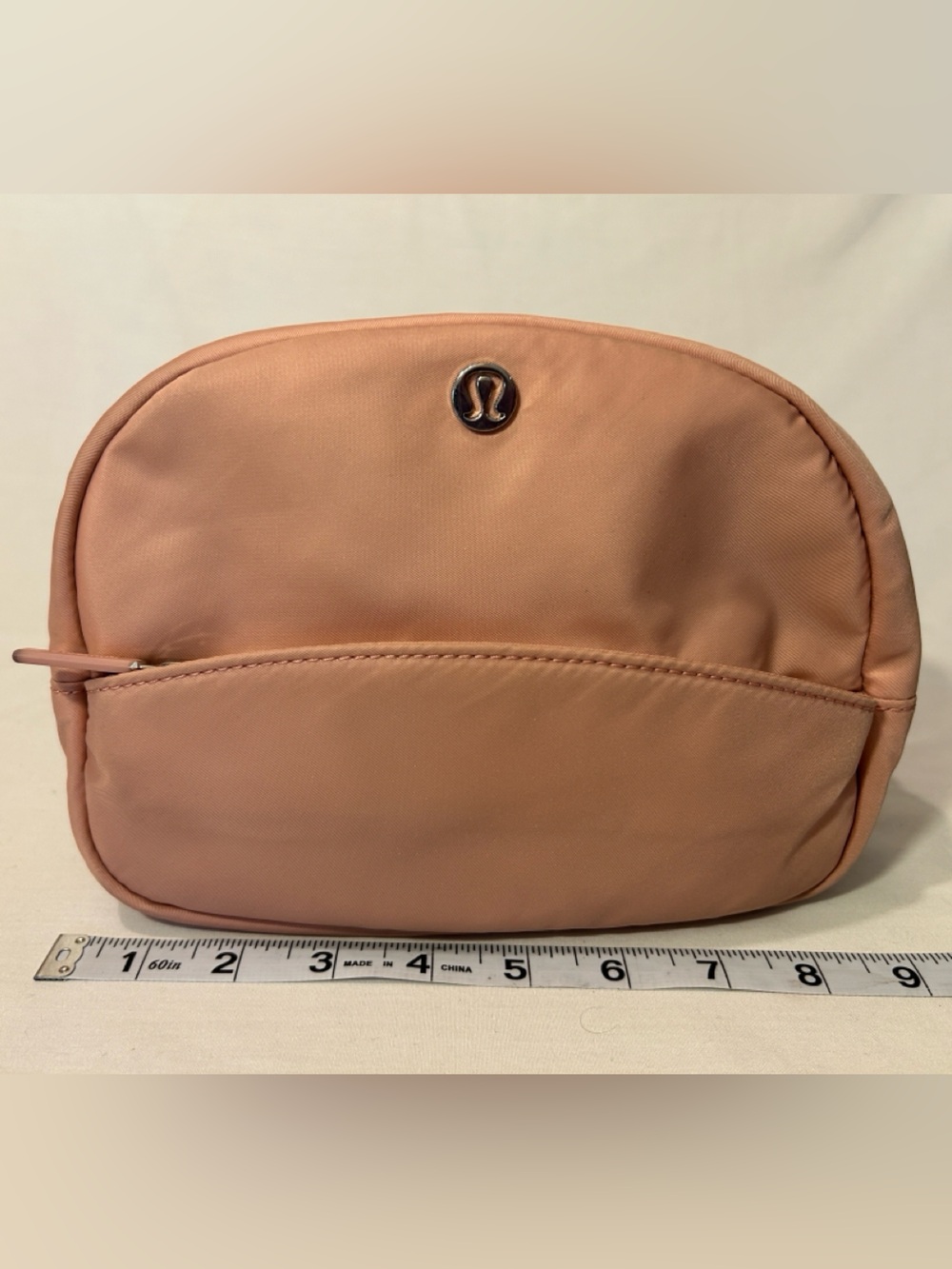 Lululemon City Essentials Pouch 4L
Color: Pink Haze / Coral